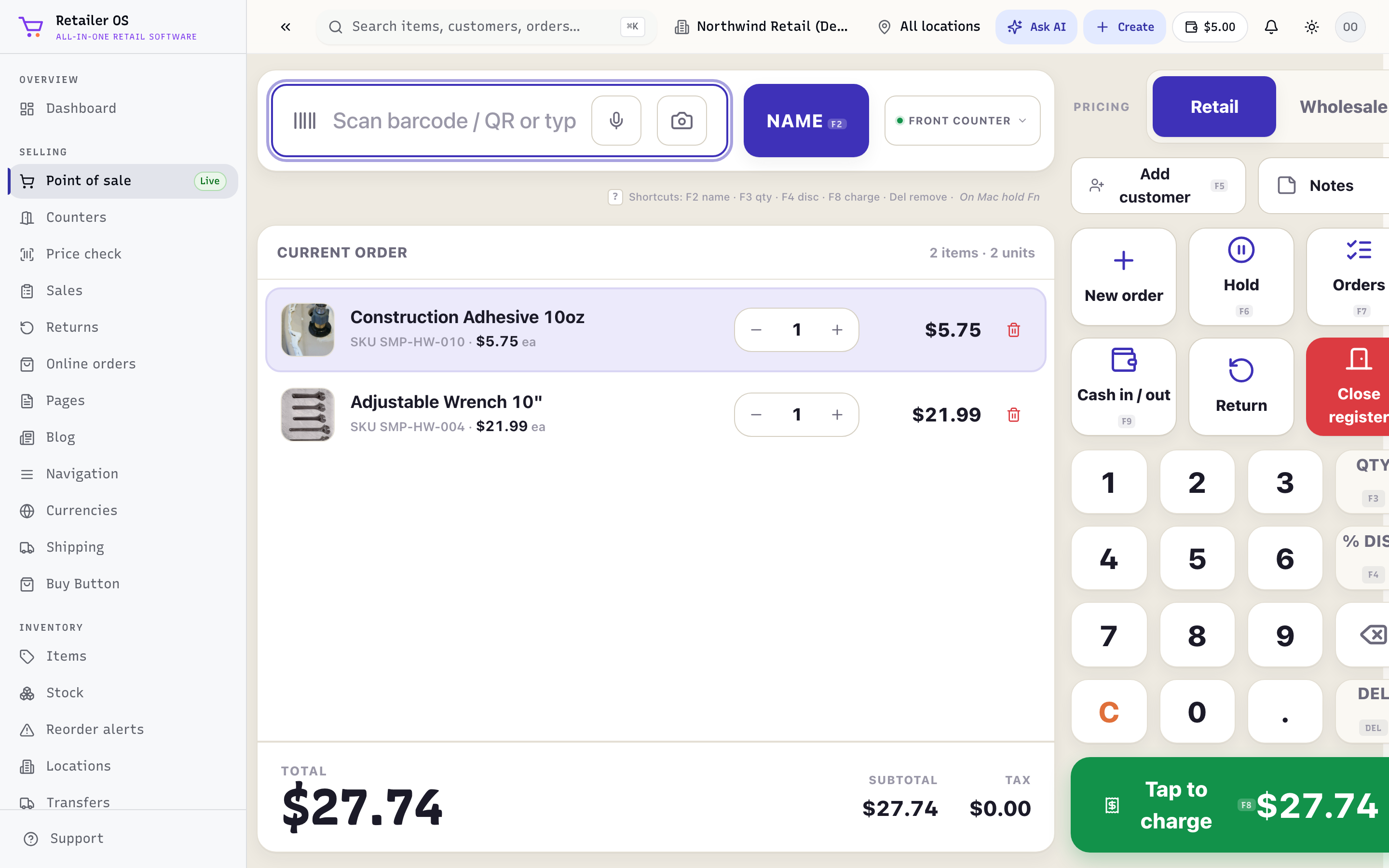 The Retailer OS point-of-sale screen with a live cart, item scan bar, and payment keypad